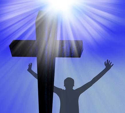 Silhouette of a man at the Cross